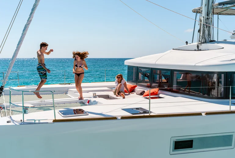 Catamaran on a Croatian charter at golden hour