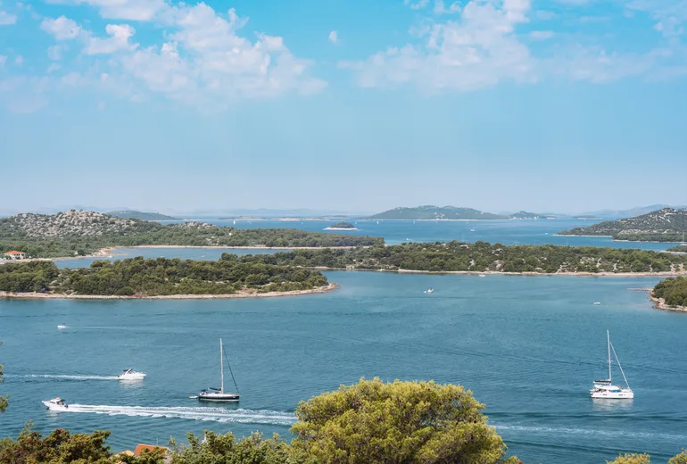 Boats cruising the island channels of the Croatian Adriatic