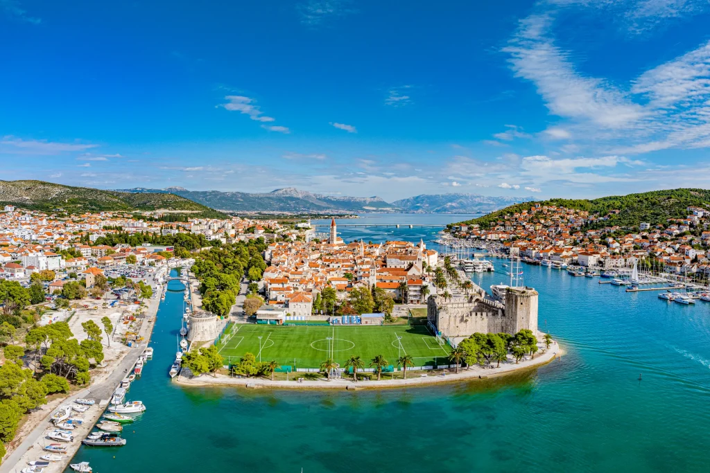 Aerial panorama of Trogir old town, Kamerlengo fortress and marinas